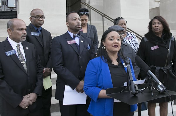 Nikema Williams, chairperson of the Democratic Party of Georgia, speaks against President Donald Trump ahead of his visit to Atlanta on Nov. 8, 2019. (Bob Andres / robert.andres@ajc.com)