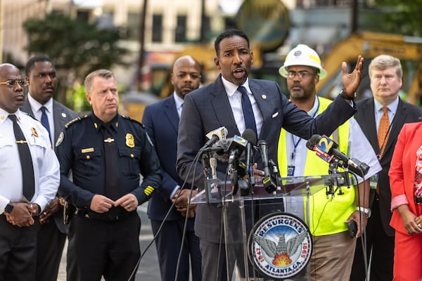 Atlanta, Mayor Andre Dickens said Monday that he took criticism from the public Òto heart.Ó Crews are continuing to work on a broken main on West Peachtree Street in Midtown, with nearby residents warned of impacts to their water service as the crisis reached its fourth day Monday, June 3, 2024. Water had been gushing out of the broken main until Monday morning, when workers were seen pumping out water. (John Spink/AJC)