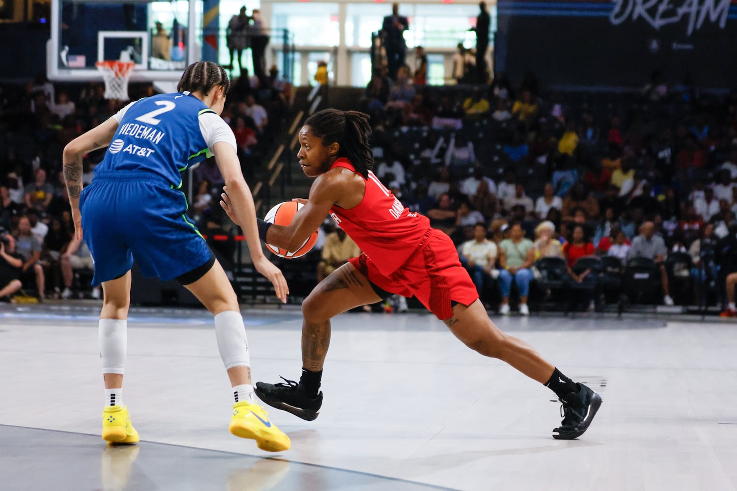 Atlanta Dream guard Crystal Dangerfield dribbles against Minnesota Natisha Hiedeman (2) during the first half at Gateway Center Arena, Sunday, May 26, 2024, in Atlanta.
(Miguel Martinez / AJC)