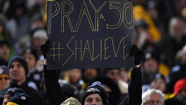 PITTSBURGH, PA - DECEMBER 10: A Baltimore Ravens fan holds up a sign honoring Ryan Shazier #50 of the Pittsburgh Steelers who was injured in a game last week during the game at Heinz Field on December 10, 2017 in Pittsburgh, Pennsylvania. (Photo by Joe Sargent/Getty Images)