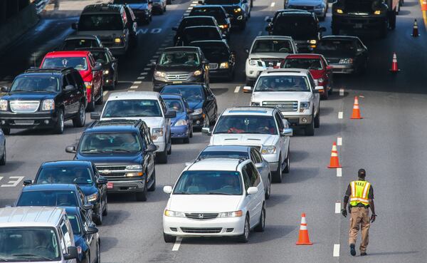 SECONDARY PHOTO - September 30, 2015 DeKalb County: Eastbound lanes of I-20 in DeKalb County were reopened Wednesday afternoon, Sept. 30, 2015 after a large amount of paint spilled onto the interstate. DeKalb police Capt. S.R. Fore said a truck was pulling a trailer loaded with 55-gallon drums of paint when two of the drums fell off near Wesley Chapel Road, prompting officials to shut down the eastbound lanes and divert traffic onto the Wesley Chapel Road exit and back onto I-20. "Paint is spilled across I-20," Fore said just after 11:30 a.m. The driver of the truck stopped, and was charged with failure to secure load. The driver's name was not released. Just before 12:20 p.m., all eastbound lanes were reopened, according to the WSB 24-hour Traffic Center. JOHN SPINK /JSPINK@AJC.COM