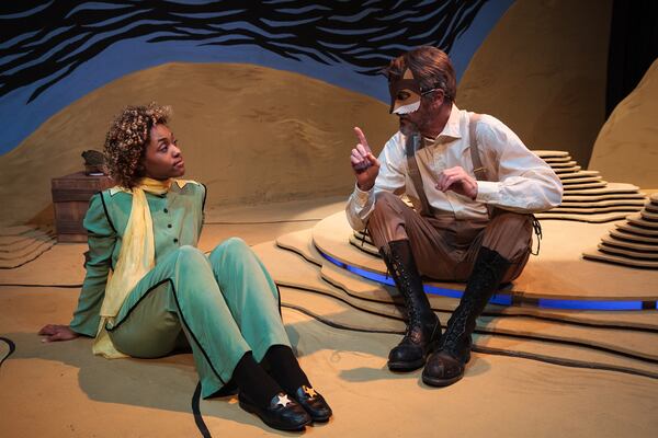 Jasmine Thomas and Chris Kayser in a scene from The Little Prince at the Théâtre du Rêve. Courtesy of Théâtre du Rêve. Photographer: Jeff Shipman