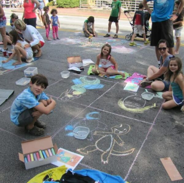 Stopping by the Chalk Spot is just one way to get in the artistic mood at Art in the Park.