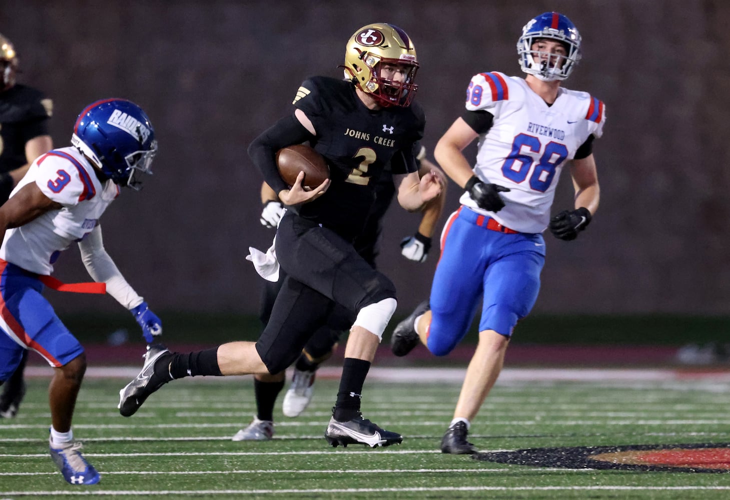 Sept. 24, 2021 - Johns Creek, Ga: Johns Creek quarterback Kyle Durham (2) runs for a long touchdown run during the first half of their game against Riverwood at Johns Creek high school Friday, September 24, 2021 in Johns Creek, Ga.. JASON GETZ FOR THE ATLANTA JOURNAL-CONSTITUTION