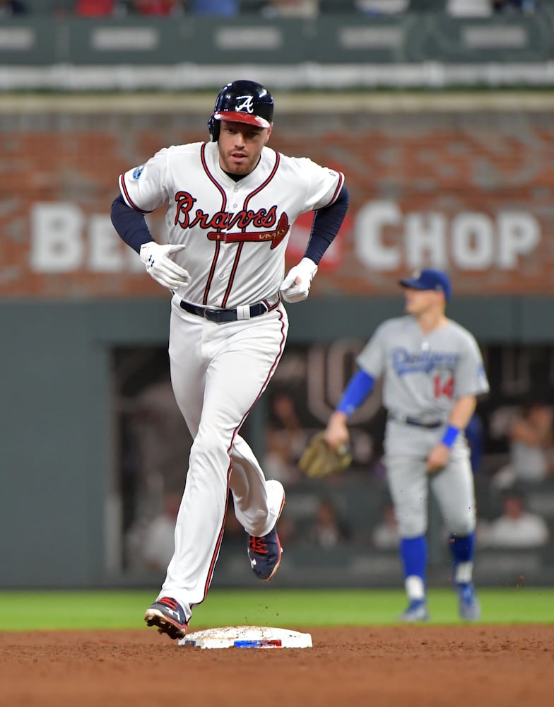 Photos: Acuna, Freeman lead Braves to playoff win over Dodgers