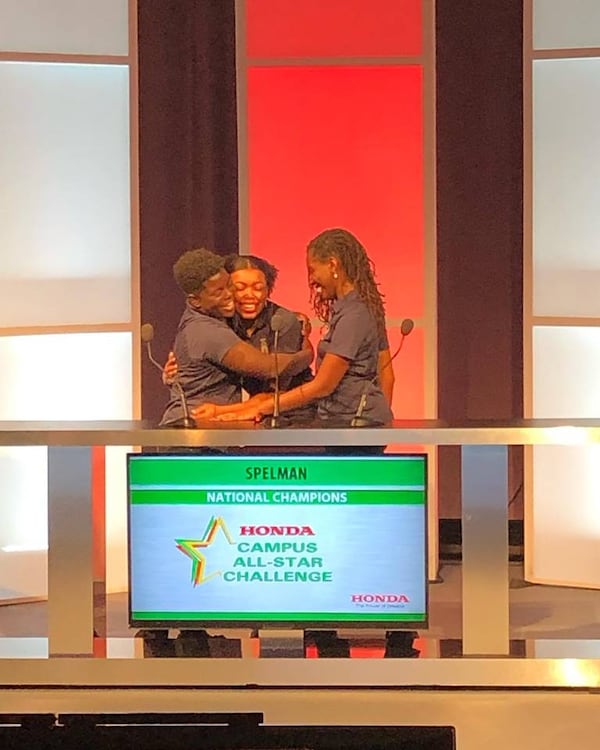 Members of the Spelman College quiz bowl team celebrate the moment they won the national championship in the Honda Campus All-Star Challenge