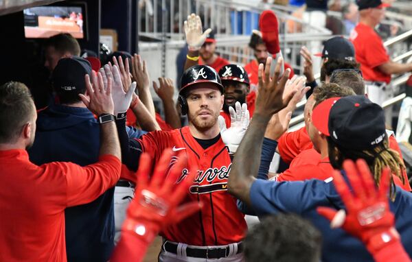 Braves first baseman Freddie Freeman (5) celebrates after hitting a home run. (Hyosub Shin / Hyosub.Shin@ajc.com)