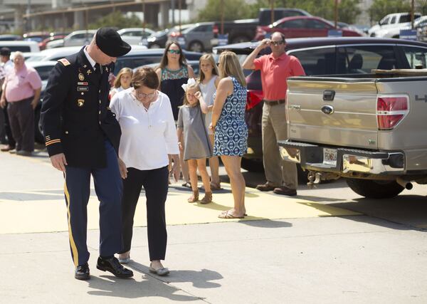 Loved ones of Lt. Robert Eugene Oxford were in attendance at Hartsfield-Jackson International Airport in Atlanta on Thursday, June 8, 2017, when the World War II veteran’s remains arrived. Oxford, of Concord, Ga., was 24 when he perished in 1944 in a plane crash over the Himalayan Mountains. (Chad Rhym/ chad.rhym@ajc.com)