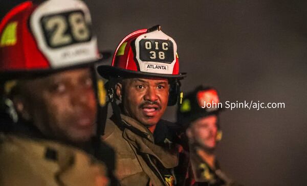 Special care is taken to stay warm and dry on cold mornings like Tuesday, according to Atlanta fire Battalion Chief Shawn Manns.