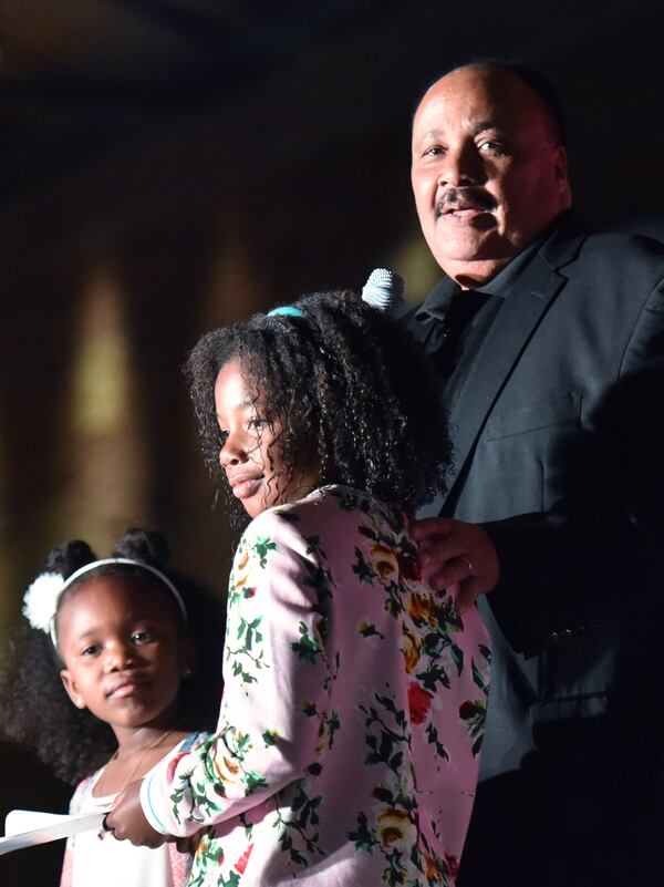  Martin Luther King III stands next to daughter Yolanda Renee King (center) during the King Centennials Speak event at Georgia Freight Depot on Saturday, April 7, 2018. TThe event was hosted by Yolanda Renee King, the granddaughter of the Rev. Martin Luther King Jr., and Maryn Rippy (left), great-granddaughter of A.D. King. HYOSUB SHIN / HSHIN@AJC.COM