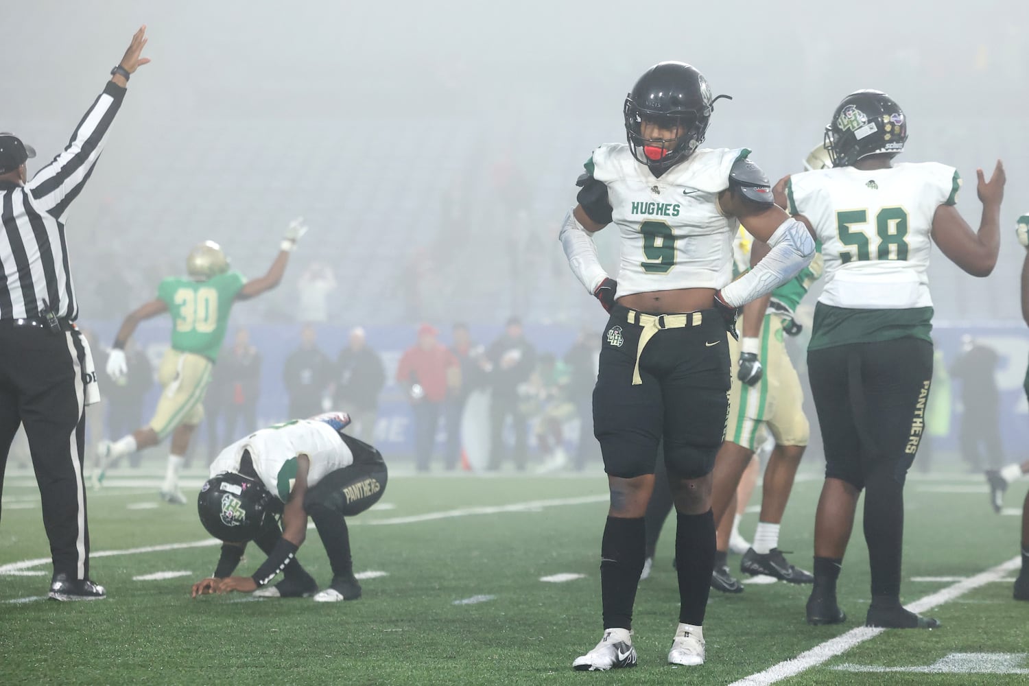 Langston Hughes tight end Michael Watson (9) reacts after Hughes kicker Alan Gonzalez (not pictured) missed the field goal in the closing seconds as Buford won 21-20 as time expires during the Class 6A state title football game at Georgia State Center Parc Stadium Friday, December 10, 2021, Atlanta. JASON GETZ FOR THE ATLANTA JOURNAL-CONSTITUTION