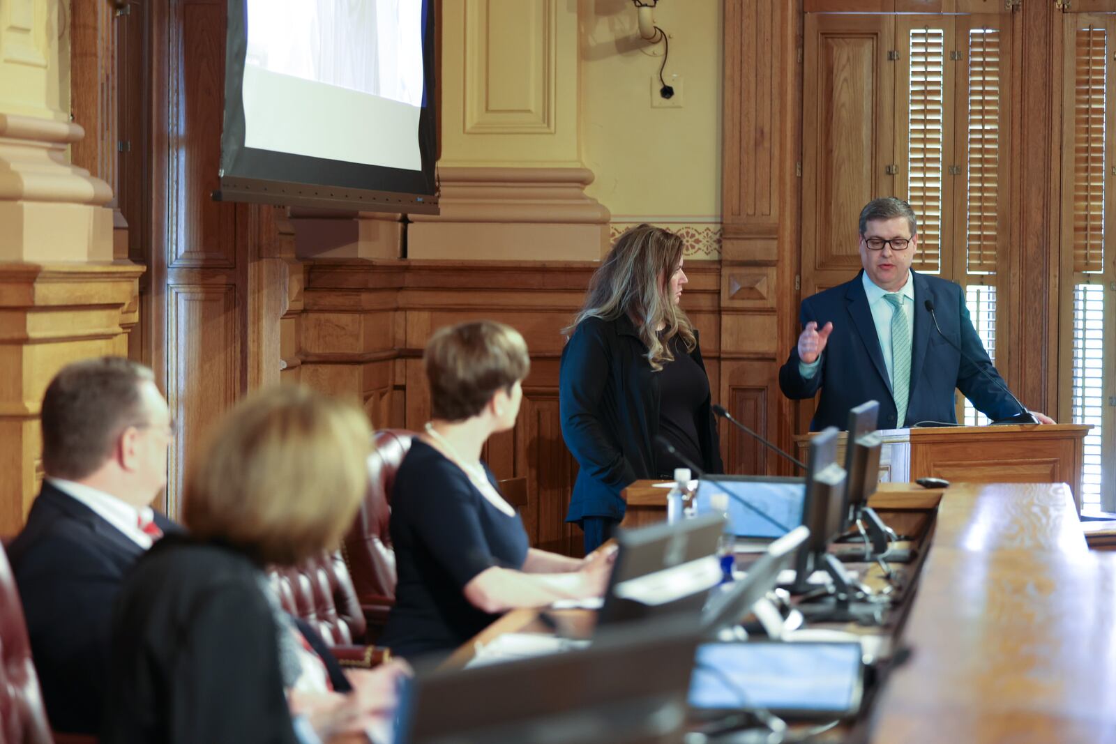 Dana Deweese. right, with the secretary of state's office, gives an update to the State Election Board on an investigation into allegations of "ballot harvesting" during the 2020 presidential election in Georgia. The investigations have not validated claims made in a move called "2000 Mules" that claims the election was stolen from Donald Trump. Miguel Martinez/ miguel.martinezjimenez@ajc.com