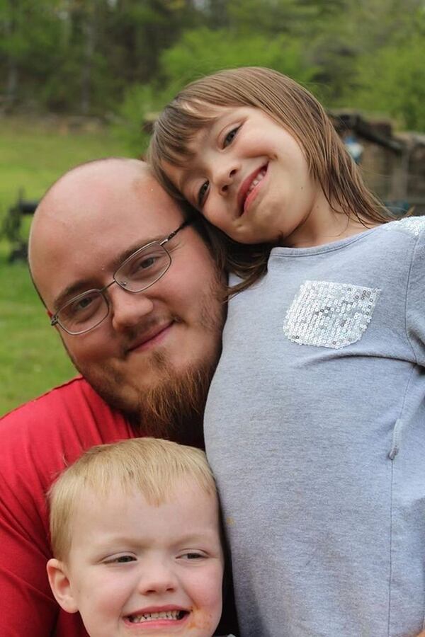 Joey Camp with his children, Amelia and Aeson. 