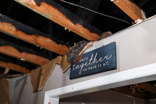 The damaged interior of the Willars home is shown after a house fire earlier this month, Thursday, Jan. 30, 2025, in Conyers, Ga. Chris and April Willars were on the property to salvage any items they could. They were also impacted by the Biolab fire and a tornado in the past year. (Jason Getz / AJC)