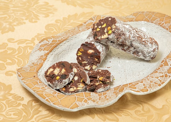 Chocolate Salami is made with chocolate, dried fruits, nuts and crumbled cookies. (Styling by Julie Frazier / Aaliyah Man for The Atlanta Journal-Constitution)