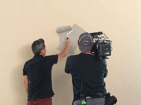  Vern Yip painting during the taping of a "Trading Spaces" episode. CREDIT: Rodney Ho/rho@ajc.com