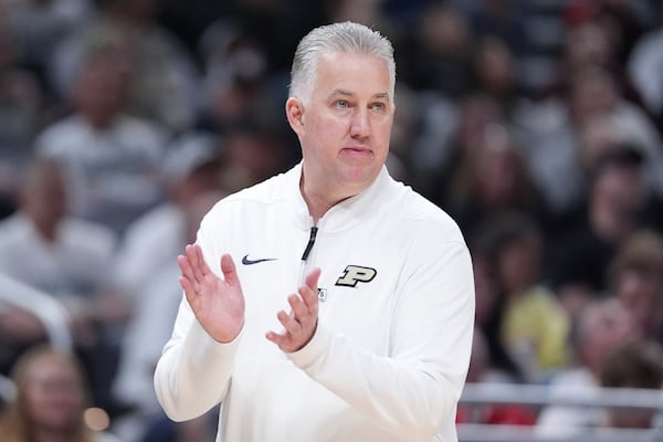 Purdue head coach Matt Painter watches against the Michigan during the first half of an NCAA college basketball game in the quarterfinals of the Big Ten Conference tournament in Indianapolis, Friday, March 14, 2025. (AP Photo/Michael Conroy)