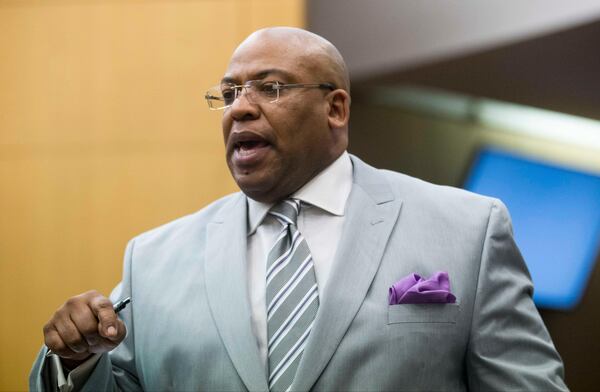 03/09/2018 -- Atlanta, GA - Fulton County Chief Assistant District Attorney Clint Rucker direct examines Bill Crane on Monday, March 9, 2018. ALYSSA POINTER/ALYSSA.POINTER@AJC.COM