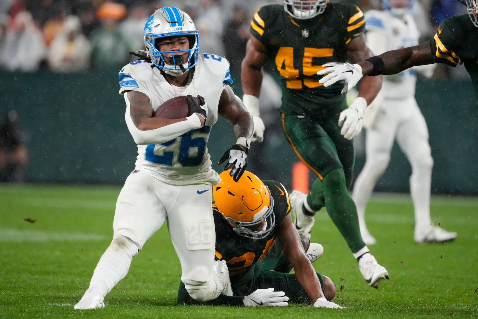 Detroit Lions running back Jahmyr Gibbs (26) runs during the second half of an NFL football game against the Green Bay Packers, Sunday, Nov. 3, 2024, in Green Bay, Wis. (AP Photo/Morry Gash)