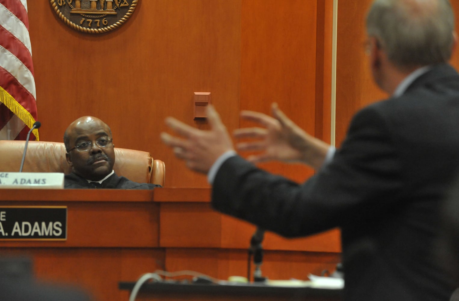 Dunwoody widow appears at a motions hearing before Dekalb County Superior Judge Gregory A. Adams on Feb. 21, 2013.