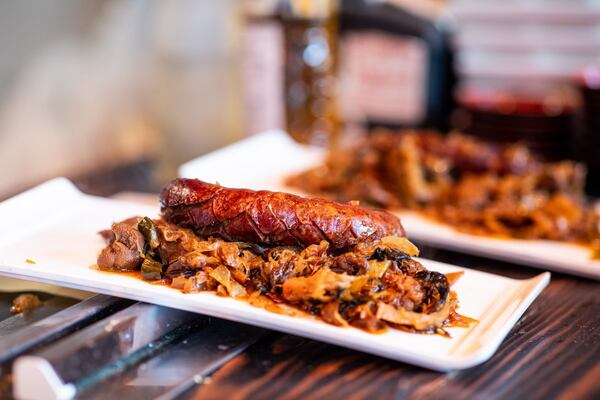 Bigos, a Polish hunter’s stew of roasted cabbage, dried plum, lion’s mane mushroom and kielbasa, is a rotating dish from Polish pop-up Brave Wojtek. (Photo by Eugene Buchko)