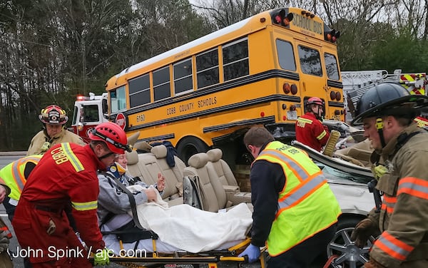 A driver was injured in a school bus crash Tuesday on Austell Road in Cobb County.