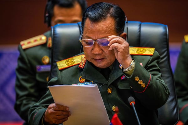 Laos' Defence Minister Chansamone Chanyalath addresses the ASEAN Defence Ministers' informal Meeting in Vientiane, Laos, Wednesday, Nov. 20, 2024. (AP Photo/Anupam Nath)