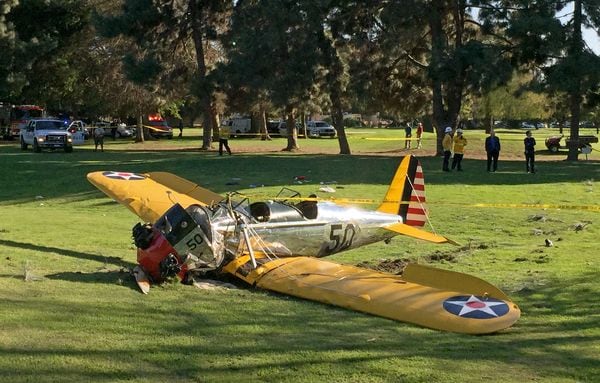 Harrison Ford crash-landed a small vintage plane in Los Angeles on March 5, 2015, but was reported in fair condition after being taken to an area hospital. (AP Photo/Damian Dovarganes)