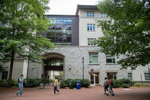 People walk past Longstreet-Means Hall on the Emory University campus in Atlanta, Tuesday, June 29, 2021. Emory University will change the name of the building to Eagle Hall. (Alyssa Pointer / Alyssa.Pointer@ajc.com)

