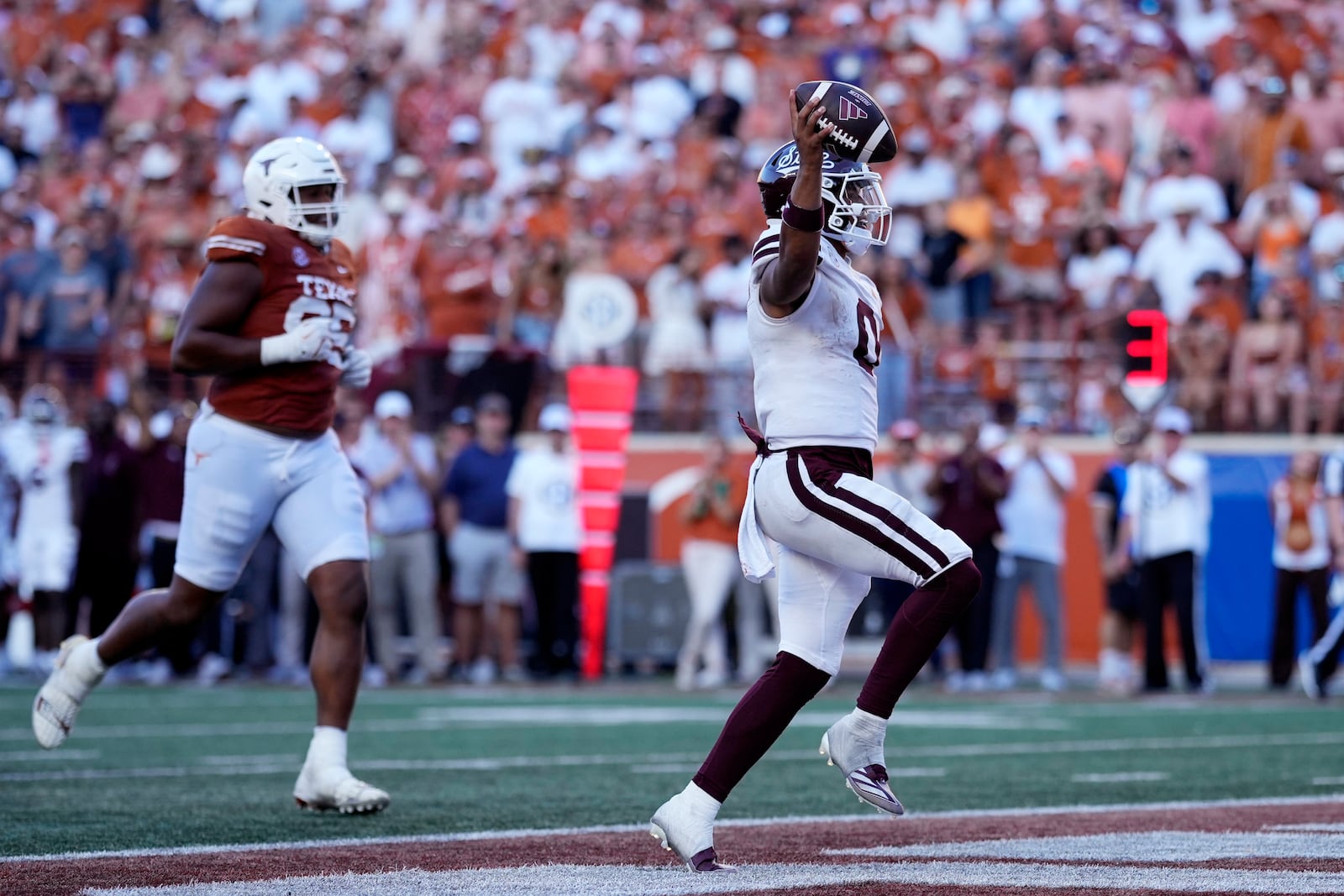 Mississippi State quarterback Michael Van Buren Jr. (0) scores a touchdown against Texas during the second half of an NCAA college football game in Austin, Texas, Saturday, Sept. 28, 2024. (AP Photo/Eric Gay)