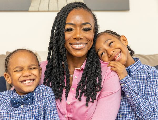 Shea Guillory and 6-year-old twins Sawyer, left, and Saxton, right, are at their home Monday, January 17, 2022.  Guillory manages the busy boys and  Sawyer's sickle-cell disease while home schooling with help from her mother; while her husband works as a government contractor.  (Jenni Girtman for The Atlanta Journal-Constitution)