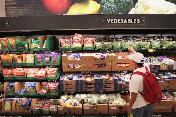 CHICAGO, IL - JUNE 12:  Customers shop at an Aldi grocery store on June 12, 2017 in Chicago, Illinois. Aldi has announced plans to open 900 new stores in the United States in the next five years. The $3.4 billion capital investment would create 25,000 jobs and make the grocery chain the third largest in the nation behind Wal-Mart and Kroger.  (Photo by Scott Olson/Getty Images)