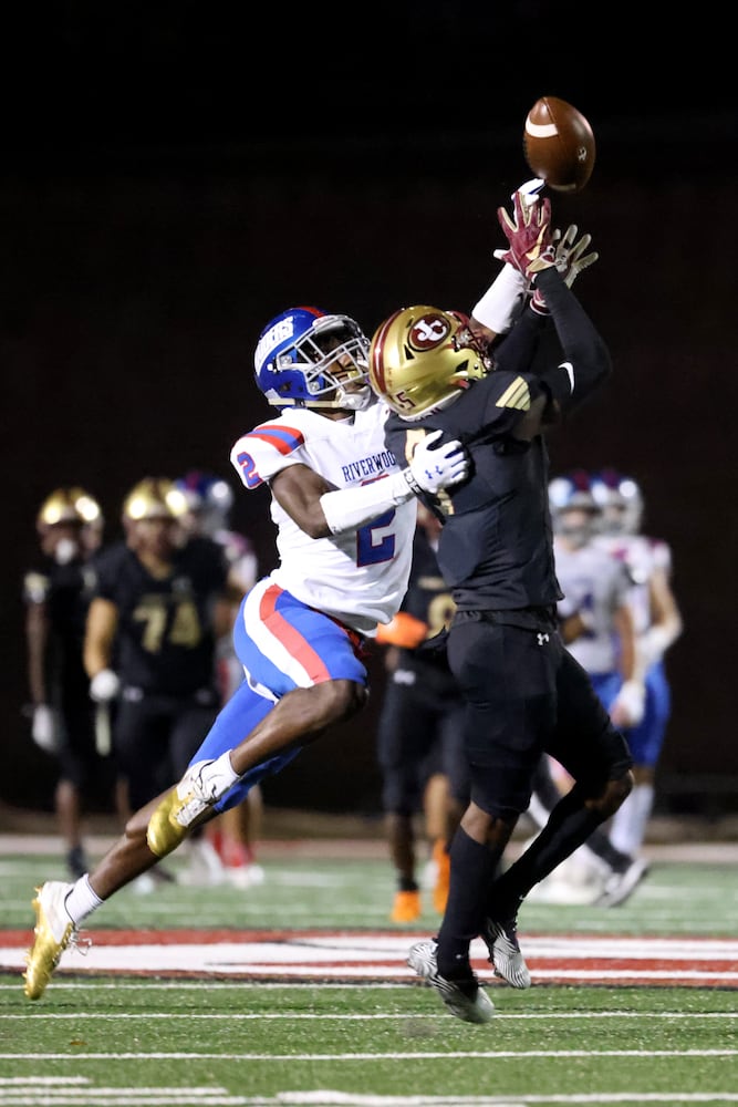 Sept. 24, 2021 - Johns Creek, Ga: Riverwood defensive back Jaden Harris (2) deflects a pass intended for Johns Creek wide receiver Josh Thompson (5) during the first half at Johns Creek high school Friday, September 24, 2021 in Johns Creek, Ga.. JASON GETZ FOR THE ATLANTA JOURNAL-CONSTITUTION