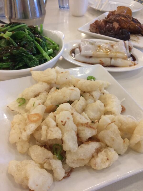 A selection of dim sum at Won Won Seafood Restaurant in Duluth includes salt and pepper squid, Chinese greens, rice noodle rolls and roast duck. CONTRIBUTED BY WENDELL BROCK