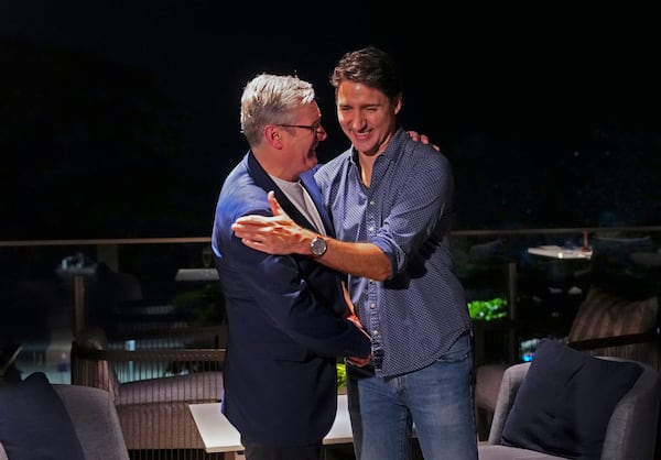 Canada's Prime Minister Justin Trudeau, right, meets with Brtain's Prime Minister Keir Starmer during the G20 Summit in Rio de Janeiro, Monday, Nov. 18, 2024. (Sean Kilpatrick/The Canadian Press via AP)