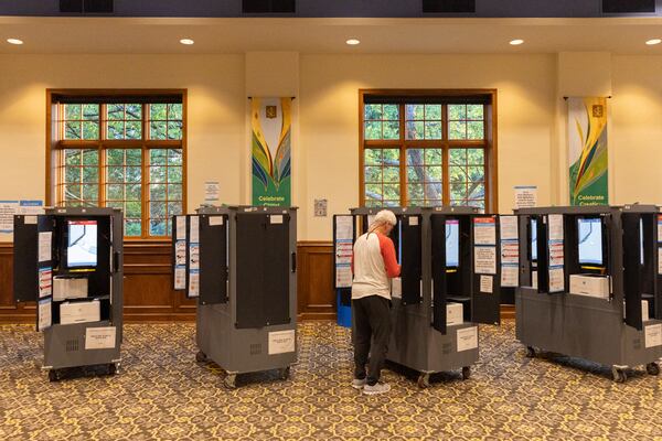 A Fulton County voter votes on primary election day at St. Luke’s Episcopal Church in Atlanta on Tuesday, May 21, 2024. (Arvin Temkar / AJC)