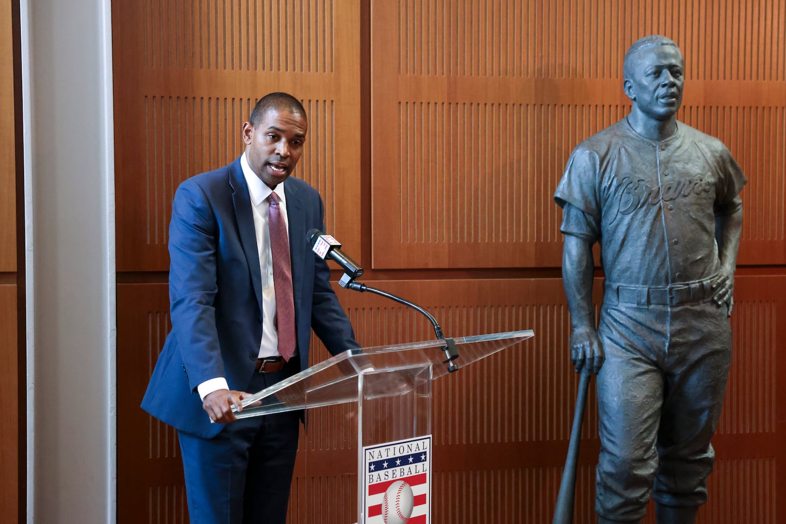 Antonio Delgado, Lieutenant Governor of New York, speaks during the unveiling of the Hank Aaron statue by the grand staircase at the National Baseball Hall of Fame, Thursday, May 23, 2024, in Cooperstown, NY. (Jason Getz / AJC)
