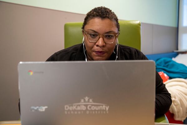 DeKalb County School District teacher Jasmine Casilla interacts with students during online learning from her daughter’s hospital room at the Children’s Healthcare of Atlanta - Egleston Hospital in Atlanta,  Jan. 29, 2021. Jasmine’s daughter has been in the hospital since November. Casilla. (Alyssa Pointer / Alyssa.Pointer@ajc.com)