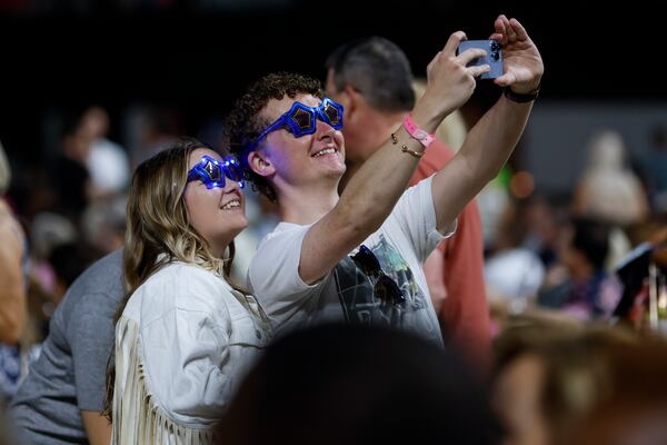 Fans take a selfie before Elton John performs at the Farewell Yellow Brick Road, The Final Tour at Mercedes Benz Stadium on Thursday, September 22, 2022.  (Natrice Miller / natrice.miller@ajc.com)