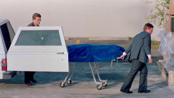 The body of Theodore "Ted" Bundy is pictured here in Gainesville, Fla. after his death in the electric chair on January 24, 1989. Bundy’s remains were being taken to the Alachua County Medical Examiner's office. 