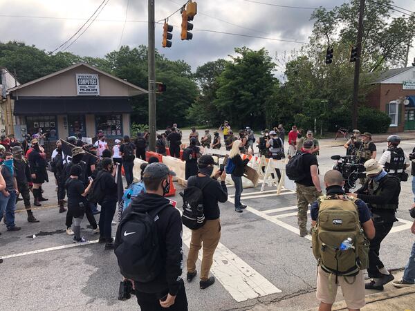 Saturday, Aug. 15., 2020, Stone Mountain -- Armed white supremacist militia members confronted leftist counter-protesters in downtown Stone Mountain.