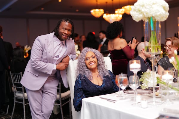 Transgender activist and House of GG founder Miss Major Griffin-Gracy received the first ever Pioneer of the Year. Joining her at Black and Iconic Soiree was BET executive Tiyale Hayes (standing), who created the program promoting Black love, joy, power and pride.


