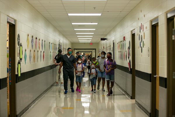 Roughly one-third of Georgia's public school students attend classes in in districts that have imposed face covering requirements to stem the spread of the coronavirus, including several of the largest metro Atlanta systems. (Rebecca Wright for the Atlanta Journal-Constitution)