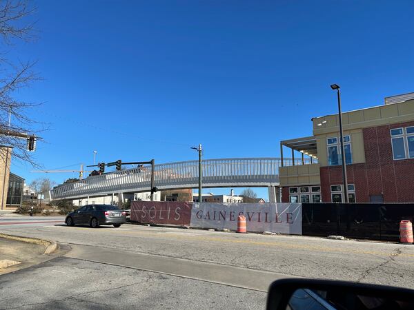 The pedestrian bridge formerly known as the "bridge to nowhere" now leads from Gainesville Square to the new Solis Gainesville project. (Tricia Cumiskey/ Fresh Take Georgia)