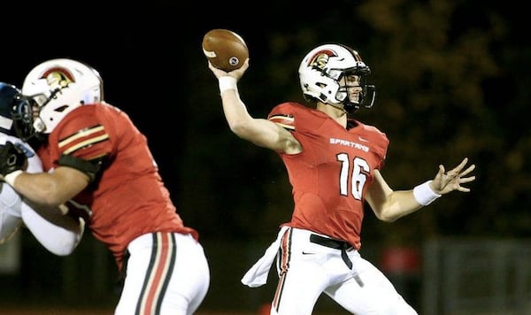 October 30, 2015 - Norcross, Ga: GAC quarterback Davis Mills (16) attempts a pass in the first half of their game against Lovett at Greater Atlanta Christian Friday in Norcross, Ga., October 30, 2015. PHOTO / JASON GETZ