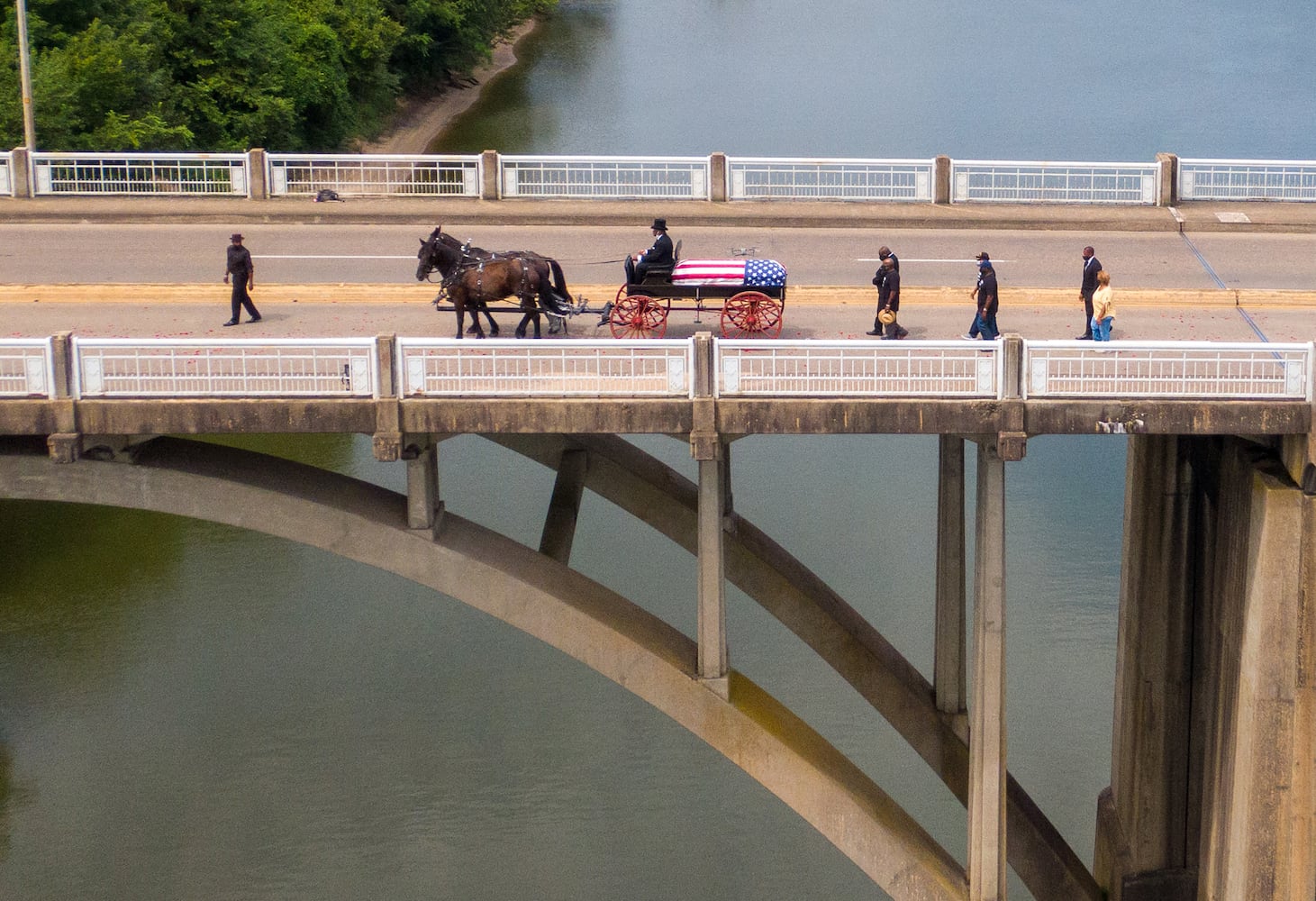 John Lewis crosses Edmund Pettus Bridge for final time