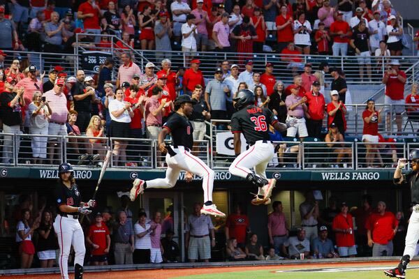 Georgia's Tre Phelps (right) celebrates with teammate Josh Stinson after a home run against Georgia Tech during last season's NCAA regional in Athens.