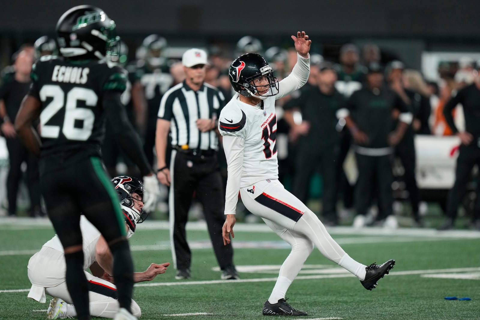 Houston Texans place kicker Ka'imi Fairbairn (15) kicks and misses a field goal during the second half of an NFL football game against the New York Jets, Thursday, Oct. 31, 2024, in East Rutherford, N.J. (AP Photo/Seth Wenig)