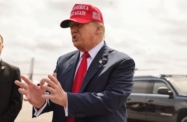 Former President Donald Trump speaks to the media after arriving at Hartsfield-Jackson International Airport on Wednesday, April 10, 2024. (Natrice Miller/ AJC)