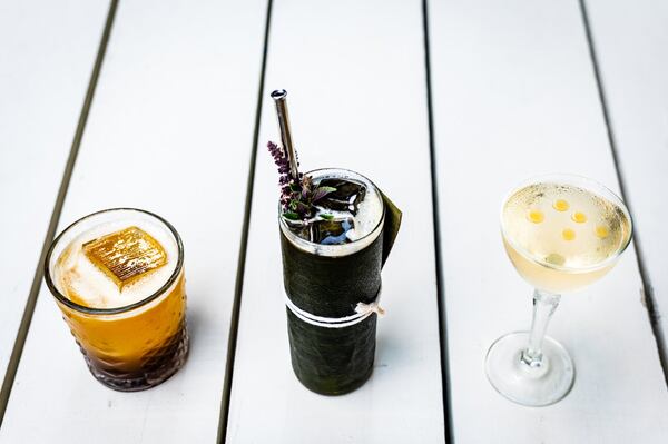 Three cocktails at Cold Beer: (from left) the Georgia Sour, Pimm’s Cup Via Thailand and Paloma Stirred. CONTRIBUTED BY HENRI HOLLIS